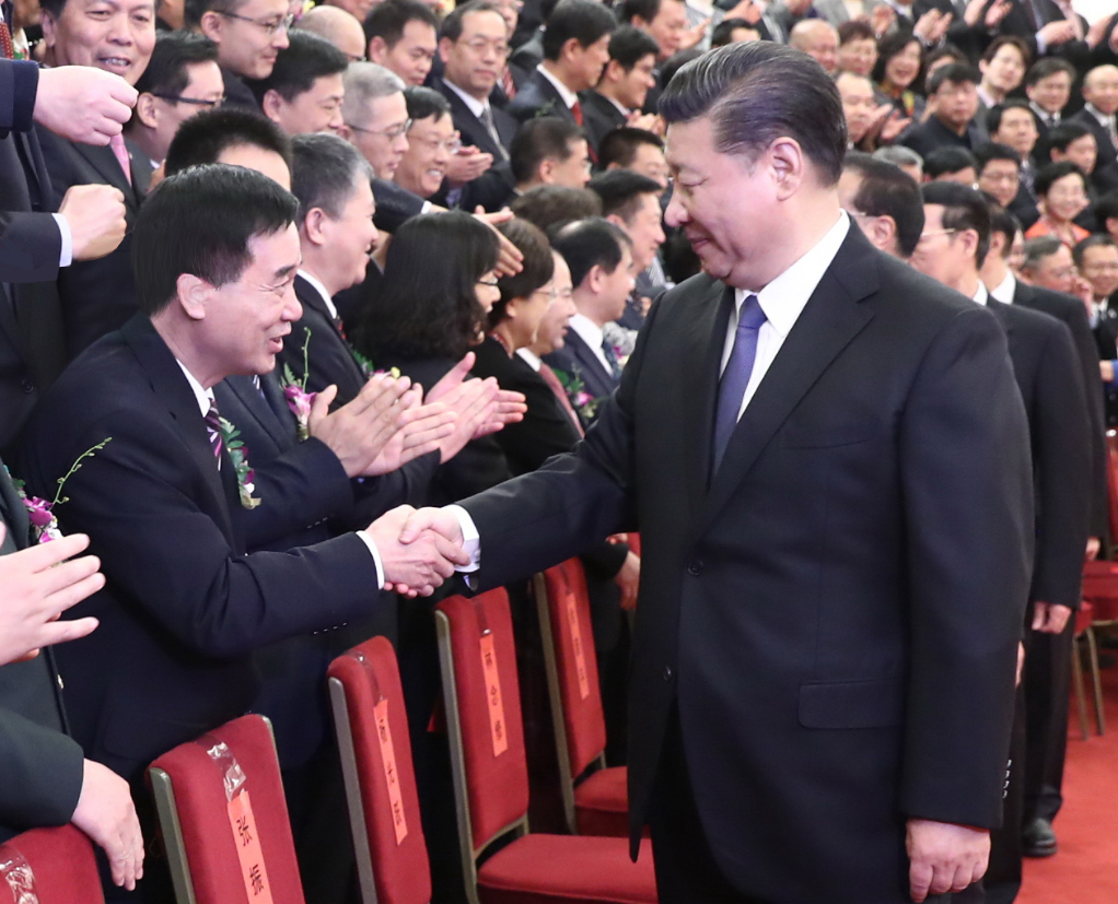 2018年1月8日，張國良榮獲國家科技進步一等獎,習近平總書記與張國良握手照片